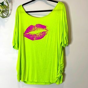 Fun 80s style neon green off shoulder over sized tee